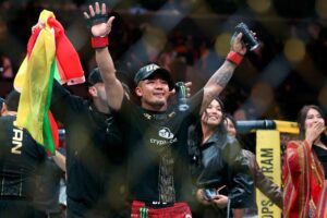 Myanmar’s Van defeats Pantoja to retain flyweight title in UFC 331